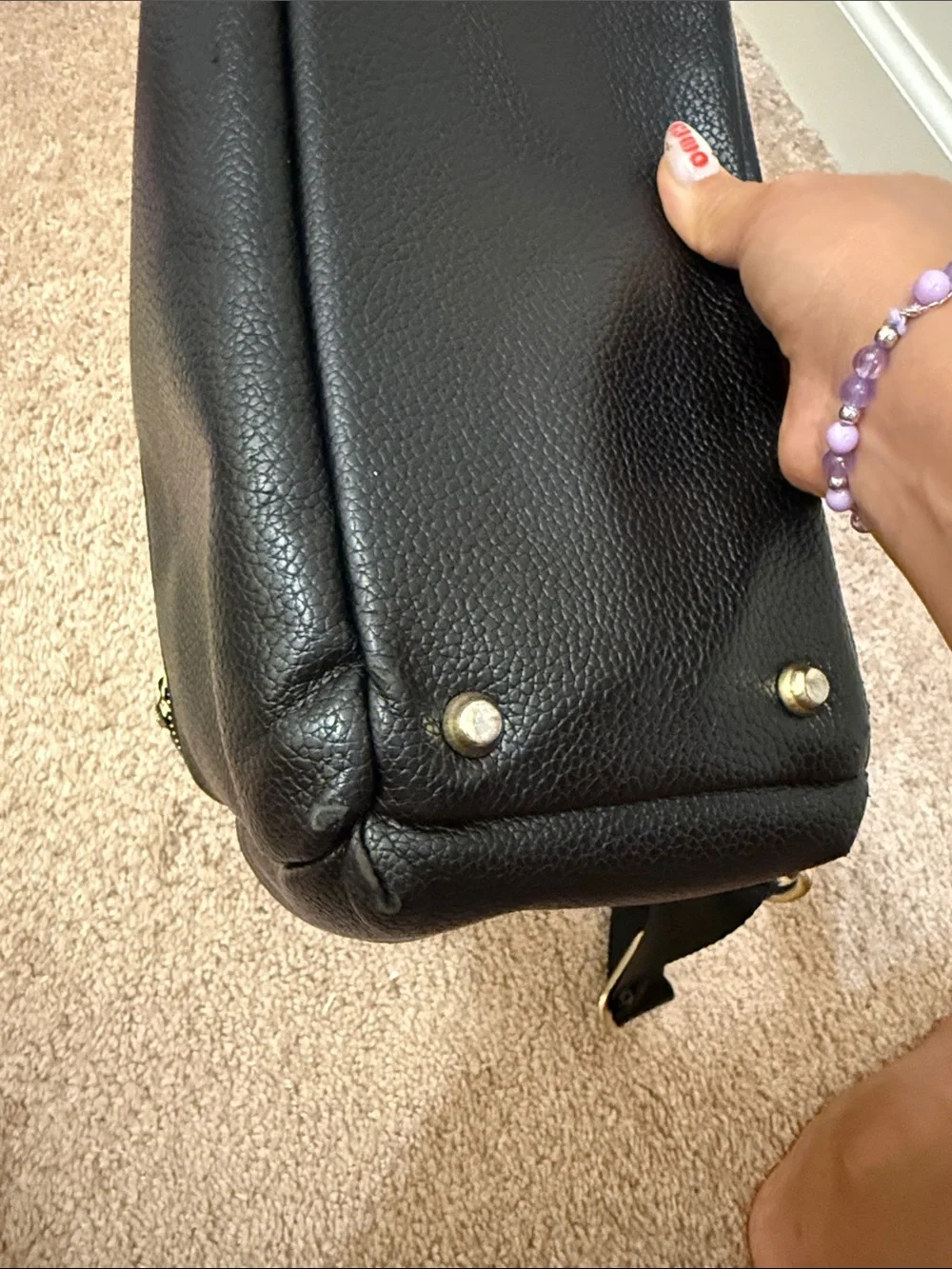 Freshly picked black leather diaper bag